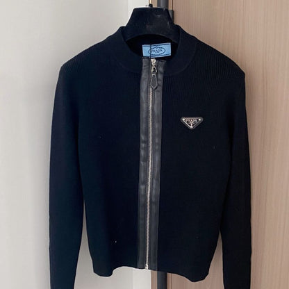 Prada black knit jacket with a full zip closure.