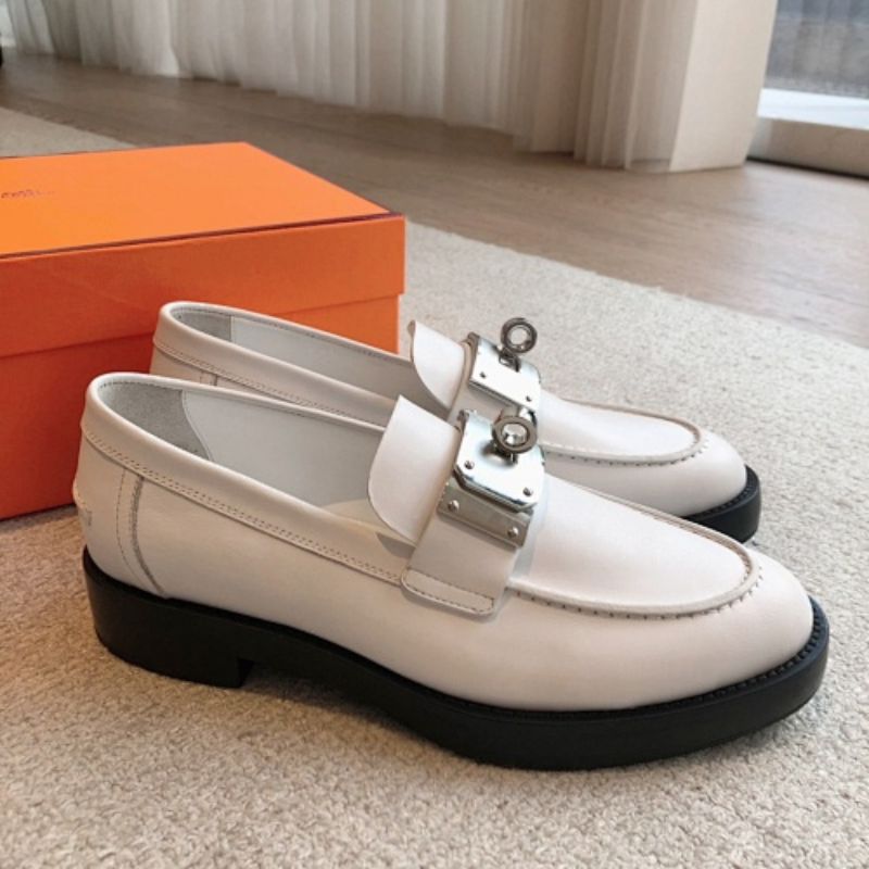 Hermès Dauphine Loafers in white (blanc) leather,