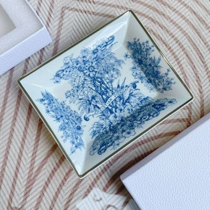 Dior Maison collection the iconic Toile de Jouy motif in blue and white.