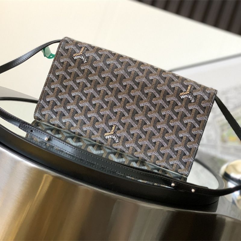 Goyard Monte-Carlo PM Clutch in the classic black