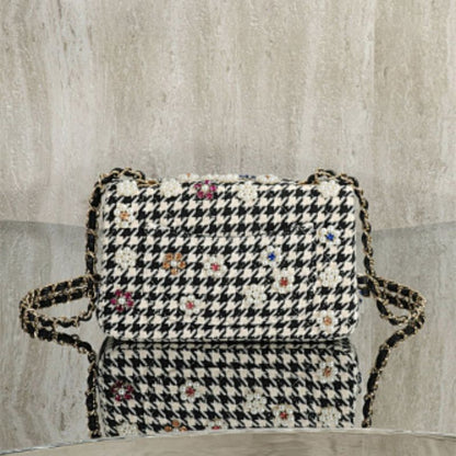 Chanel Mini Classic Handbag from the Métiers d'Art 2024 collection.