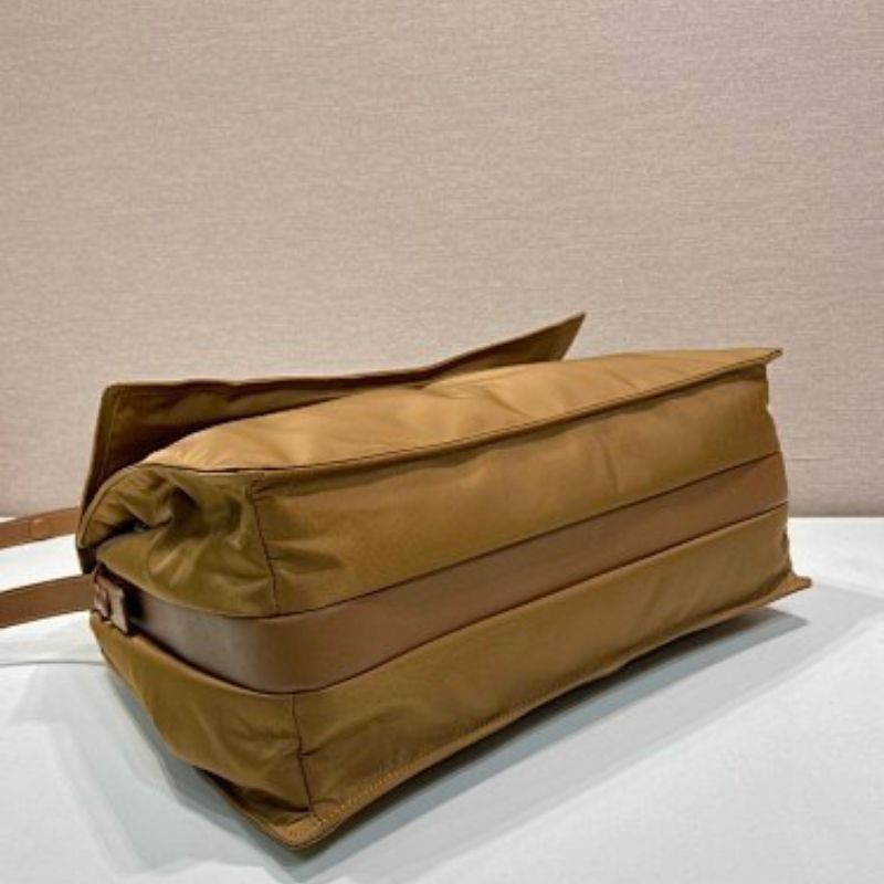 Prada Re-Nylon Large Padded Shoulder Bag in a caramel brown shade.