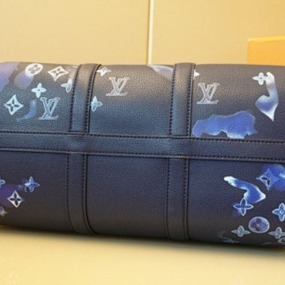 Louis Vuitton Keepall Bandoulière 50 in Monogram Ink Watercolor blue.