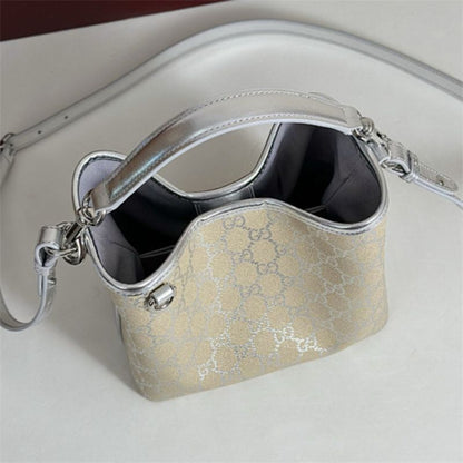Gucci GG Emblem small bucket bag.