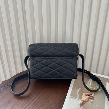 Saint Laurent June Box Bag in black quilted leather.