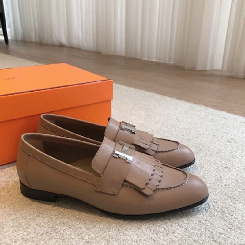 Hermès Royal Loafers in a neutral taupe/beige leather.