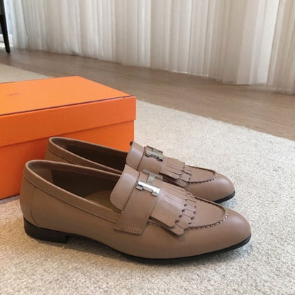 Hermès Royal Loafers in a neutral taupe/beige leather.