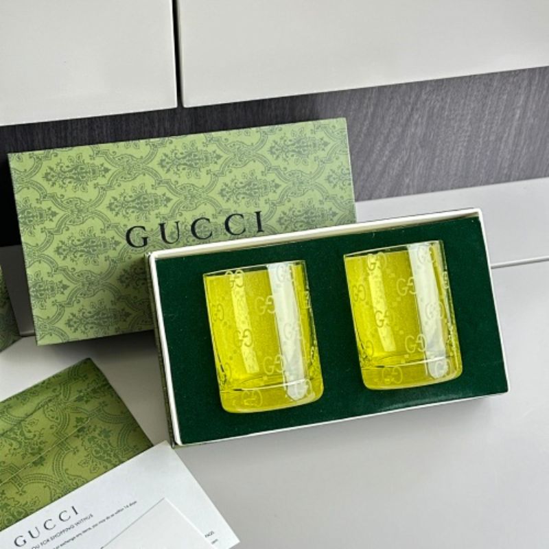 Gucci yellow-tinted crystal tumblers,