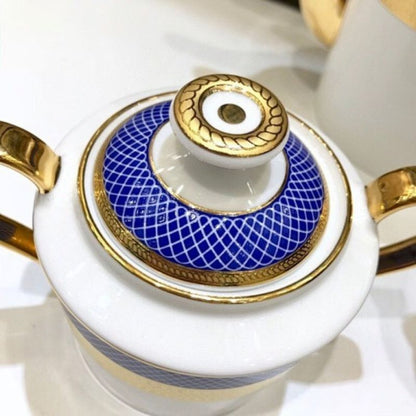 Dior royal blue and gold tea set.