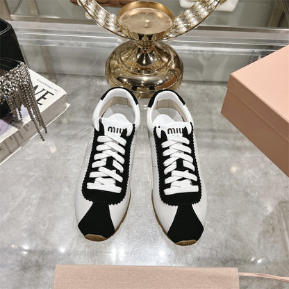 Miu Miu Plume Suede and Nappa Leather Sneakers.