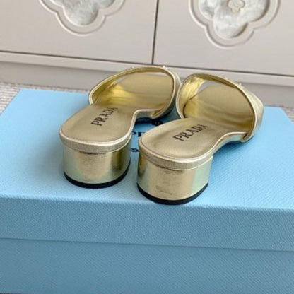Prada Saffiano Patent Leather Heeled Sandals in a metallic gold