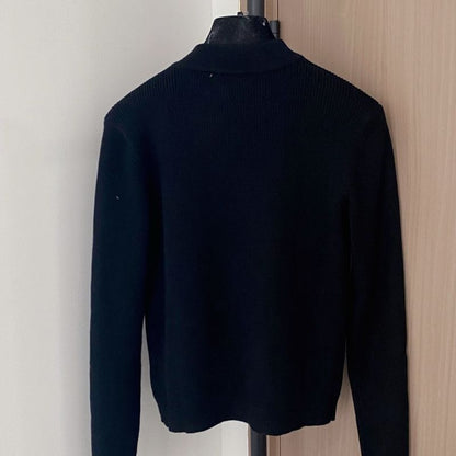 Prada black knit jacket with a full zip closure.