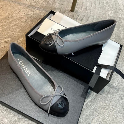 Chanel Lambskin Cap Toe CC Ballerina Flats.