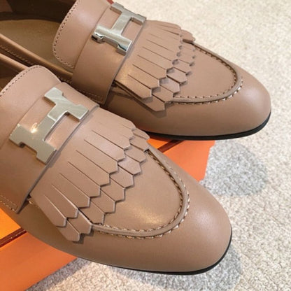 Hermès Royal Loafers in a neutral taupe/beige leather.