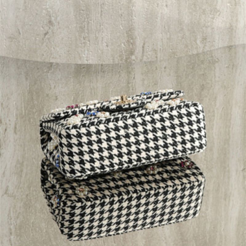 Chanel Mini Classic Handbag from the Métiers d'Art 2024 collection.