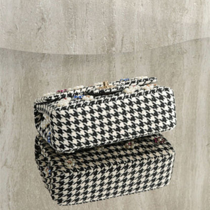 Chanel Mini Classic Handbag from the Métiers d'Art 2024 collection.