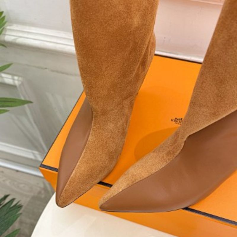 Hermès Rouxa Ankle Boots in a warm camel-brown finish.Sizes: 35-39