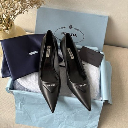 Prada 75mm Padded Triangle-Logo Leather Pumps.