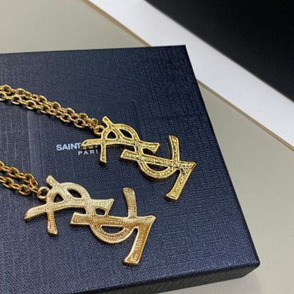 Yves Saint Laurent (YSL) monogram pendant necklaces