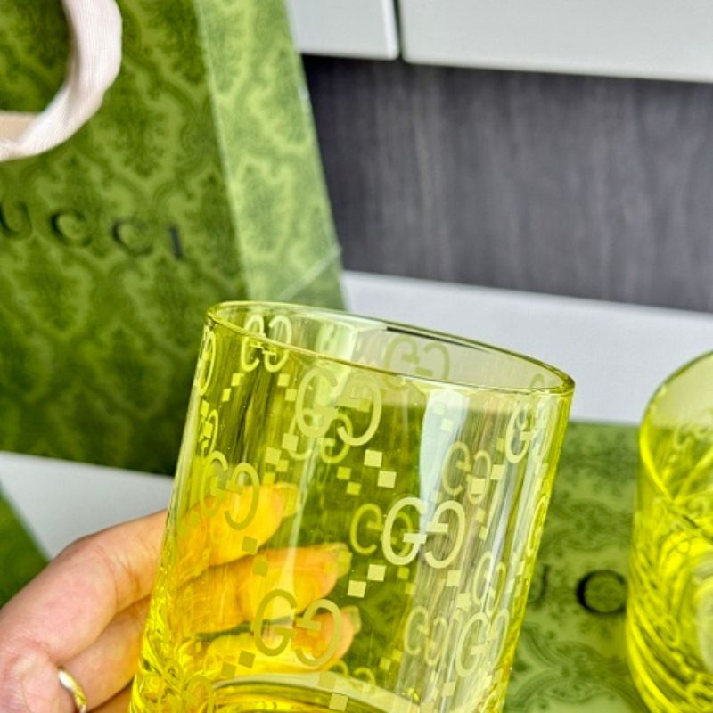 Gucci yellow-tinted crystal tumblers,