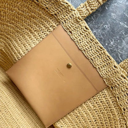 Saint Laurent Rive Gauche raffia tote bag.