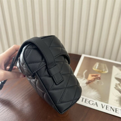 Saint Laurent June Box Bag in black quilted leather.