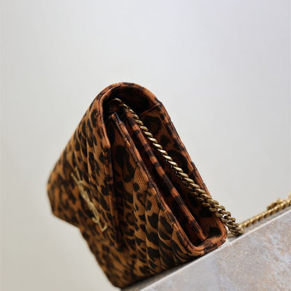 Saint Laurent Cassandre Envelope Chain Wallet with a leopard print.