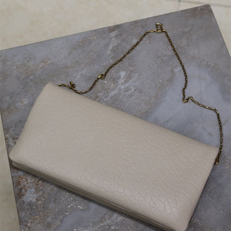 Saint Laurent Calypso Mini leather wallet on chain
