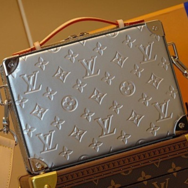 Louis Vuitton Handle Soft Trunk in Monogram Mirror coated canvas.
