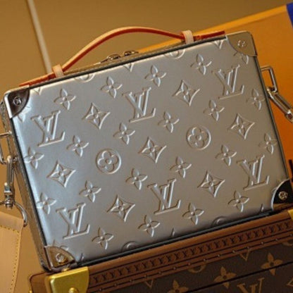 Louis Vuitton Handle Soft Trunk in Monogram Mirror coated canvas.