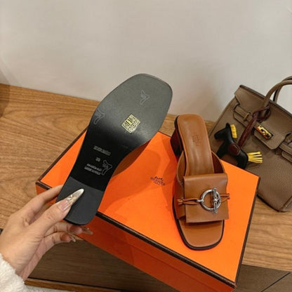 Hermès Ilot 50 Sandals in calfskin leather.