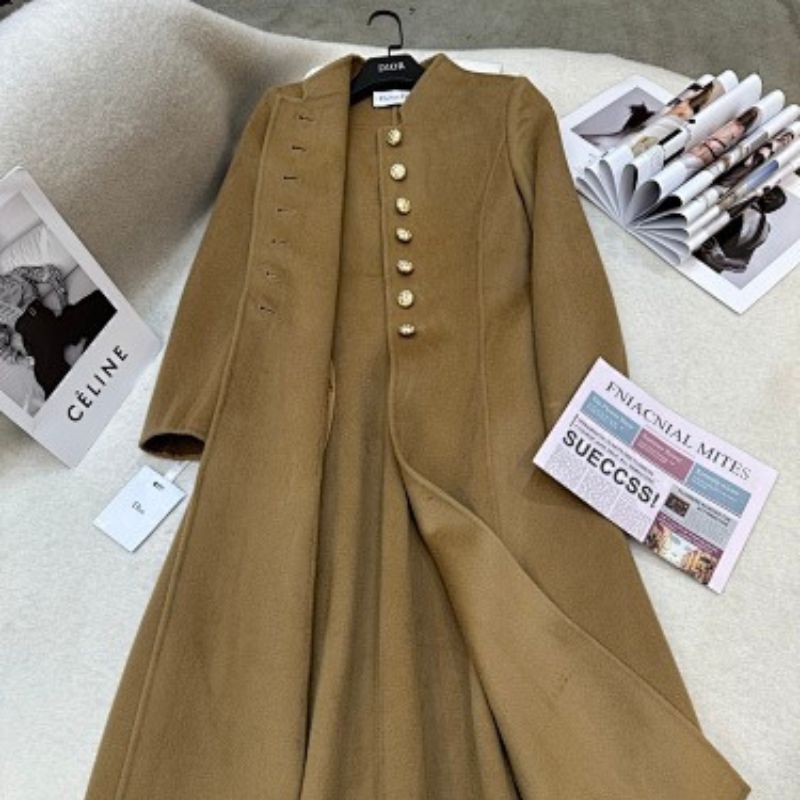 Christian Dior camel coat with gold-tone logo buttons.