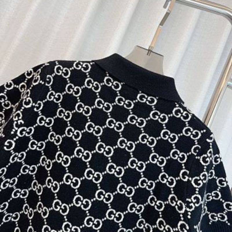 Gucci Reversible GG wool jacquard polo shirt in black and white.