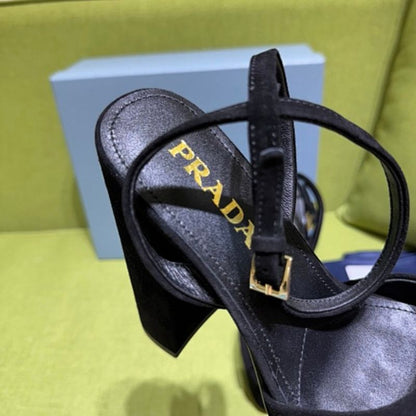 Prada Suede Platform Sandals in classic black ("Nero").