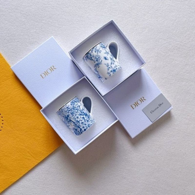 Dior Maison collection the iconic Toile de Jouy motif in blue and white.