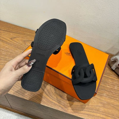 Hermès Aloha Sandals in noir (black)