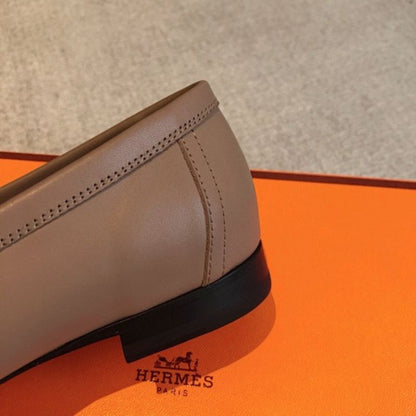 Hermès Royal Loafers in a neutral taupe/beige leather.