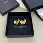 Yves Saint Laurent (YSL) textured heart logo earrings,