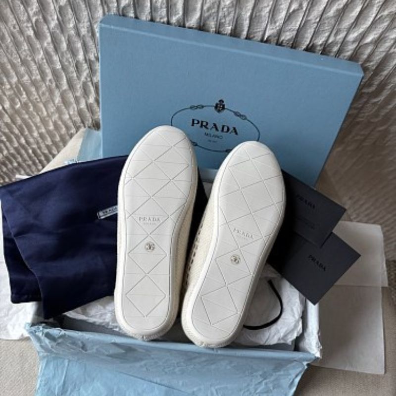 Prada Collapse Crochet Laced Sneakers in the ivory/white colorway