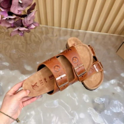 Louis Vuitton custom Birkenstock-style sandals.