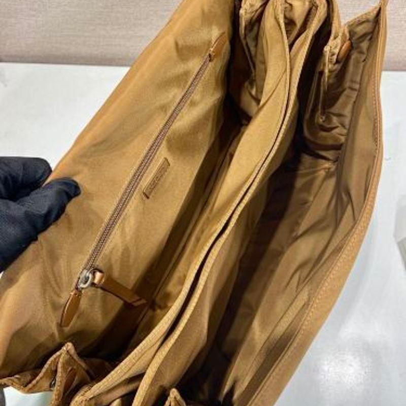 Prada Re-Nylon Large Padded Shoulder Bag in a caramel brown shade.