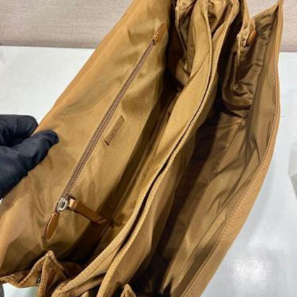 Prada Re-Nylon Large Padded Shoulder Bag in a caramel brown shade.