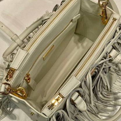 Prada Arqué Fringe Leather Handbag in a light off-white shade.