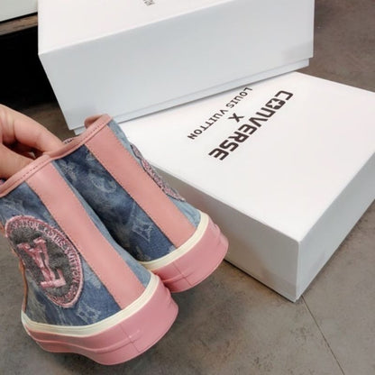 Louis Vuitton monogram print and pink laces.