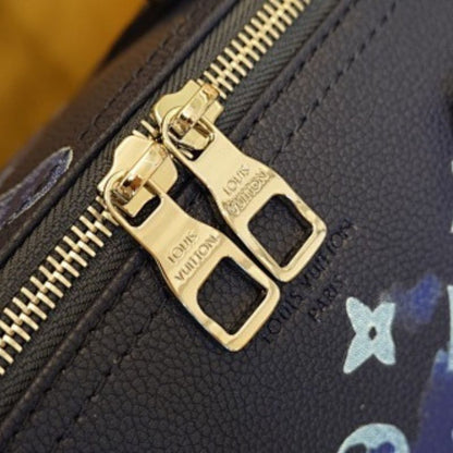Louis Vuitton Keepall Bandoulière 50 in Monogram Ink Watercolor blue.