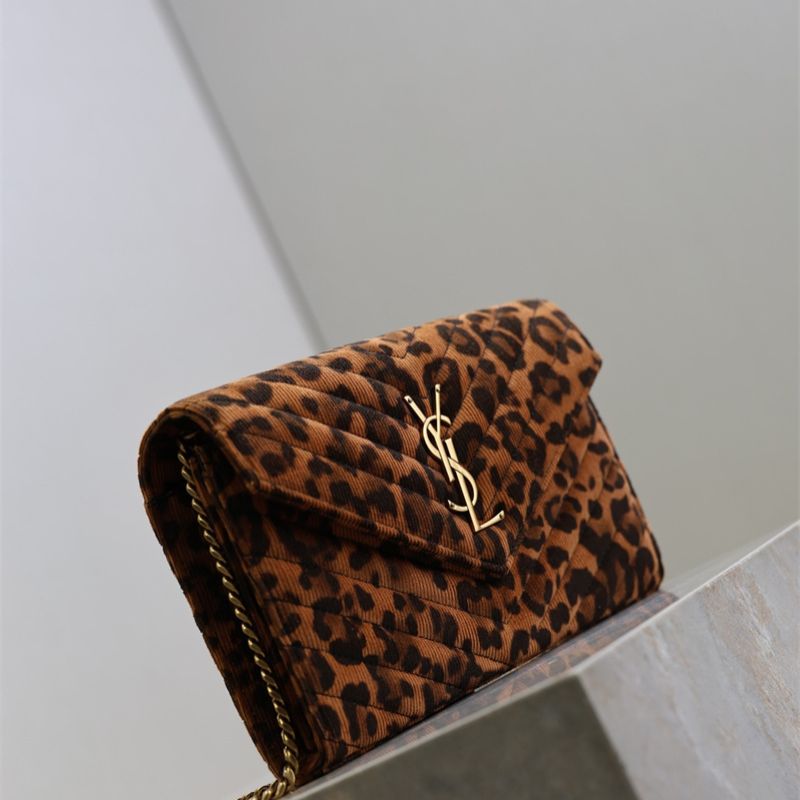 Saint Laurent Cassandre Envelope Chain Wallet with a leopard print.