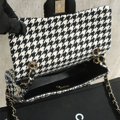 Chanel Mini Classic Handbag from the Métiers d'Art 2024 collection.