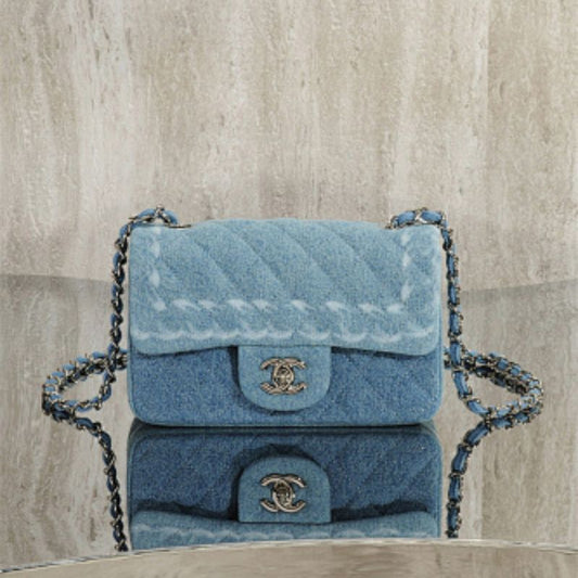 Chanel Mini Square Flap Bag crafted from blue denim.