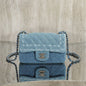 Chanel Mini Square Flap Bag crafted from blue denim.
