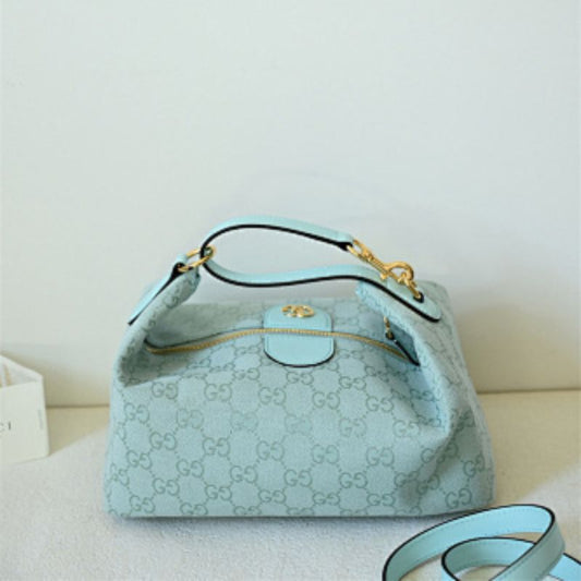 Gucci Vanity Medium Top Handle Bag from the Ophidia collection